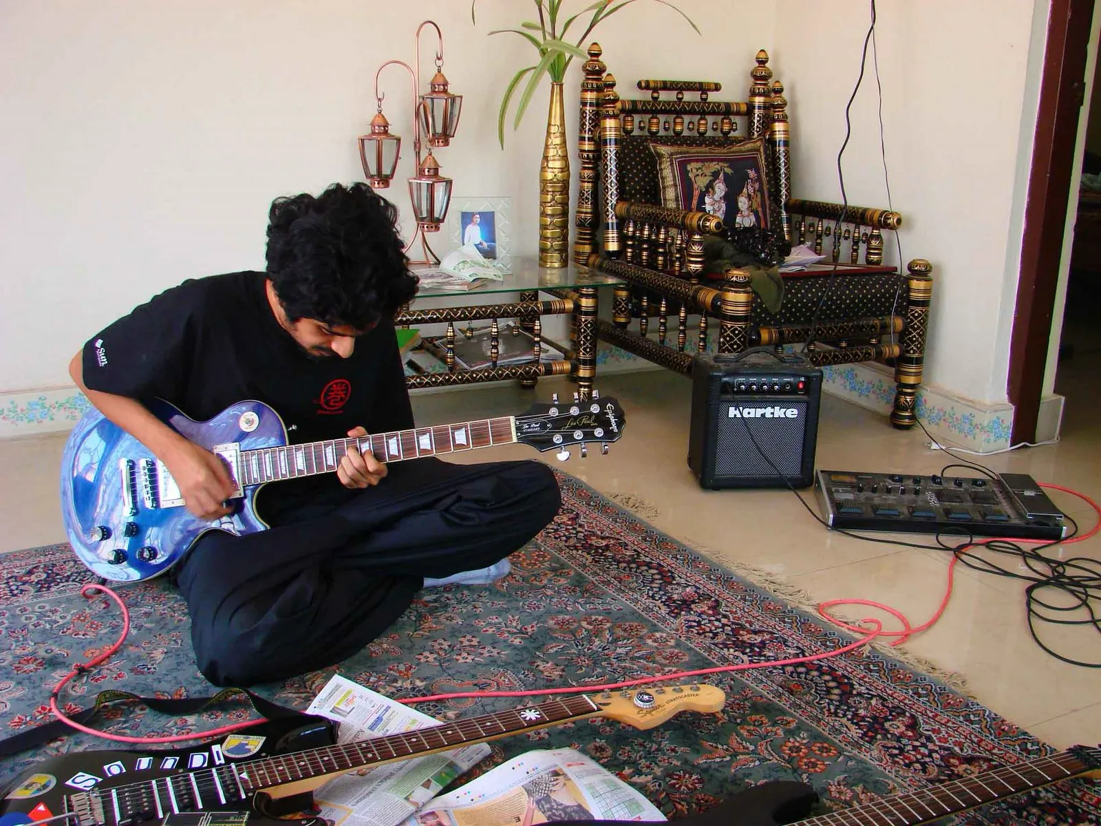 circa 2008, in my buddy's house, rocking the sun/jmaki tshirt